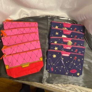 20 Estee bags. Choose from Blue W Stars  Or Pink With Gold Trim Make Up Bags.